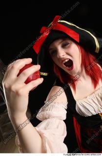 DARINA STAANDING POSE WITH APPLE